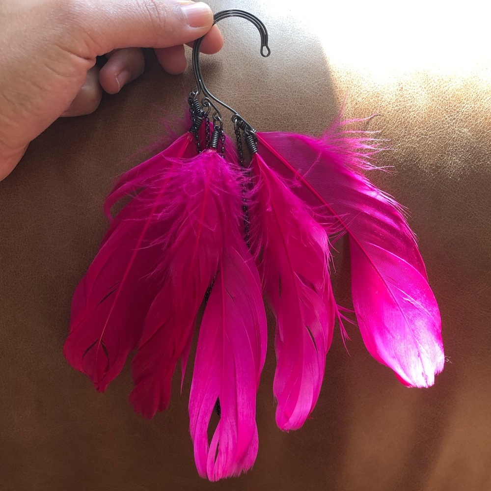 Cascading feather and chain ear cuff